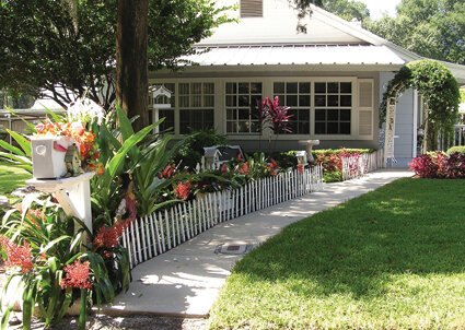 When a house and garden work together in harmony, the result can be lovely.  Photo by Monica Brandies