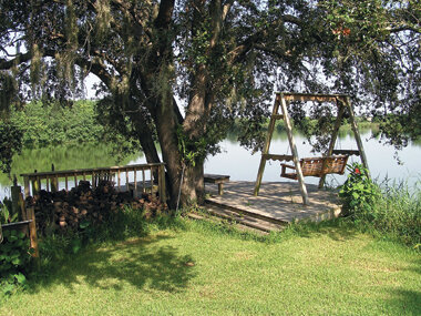 A deck and a place to sit add to the enjoyment of being near the water.  Photo by Monica Brandies