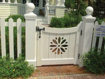 A floral cutout and ball and cap post tops really make this gate stand out.  Photo by Al Smoczynski