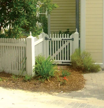 Use sturdy hardware, such as strap hinges, to keep your gate square.  Photo by Al Smoczynski